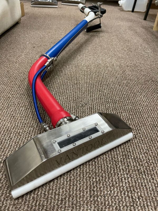 Carpet cleaning tool with Vantool logo.