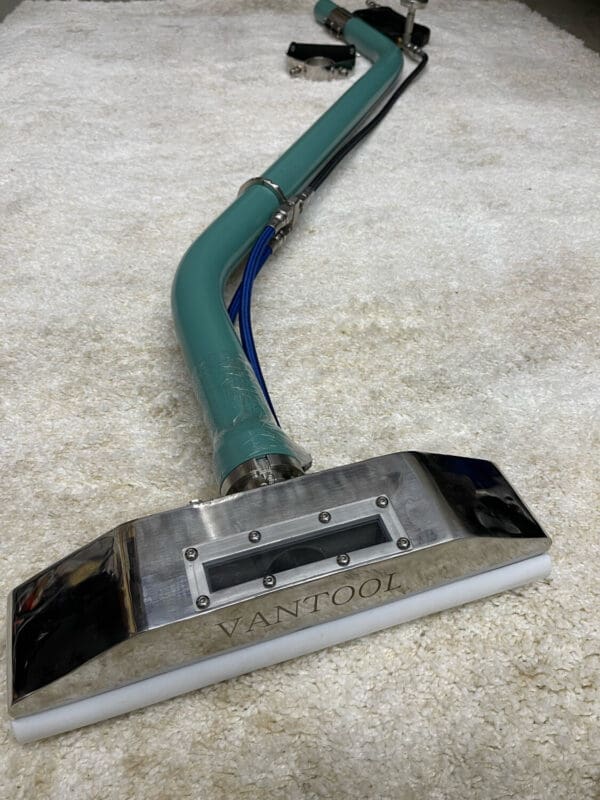 Vantool carpet cleaning tool on carpet.