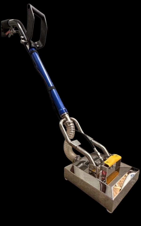 Carpet cleaning machine with handle.