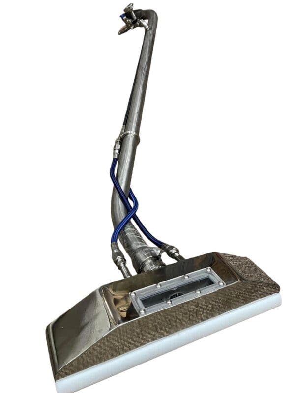 Stainless steel upholstery cleaning tool.