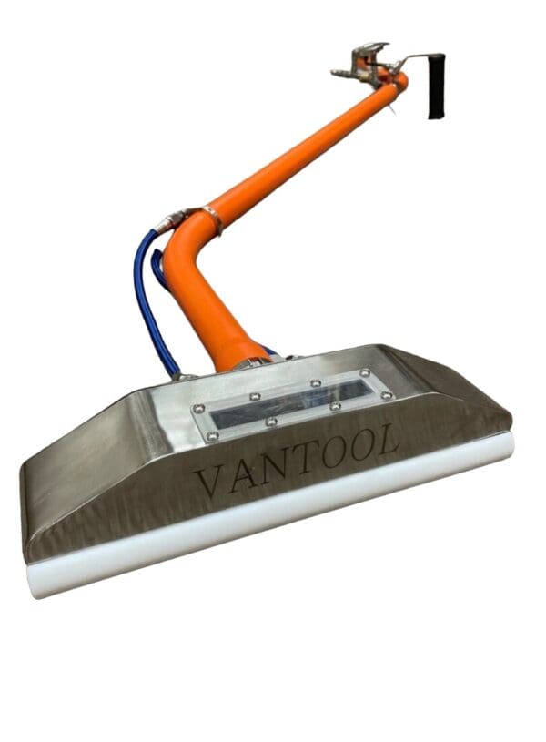 Orange and silver floor cleaning tool.