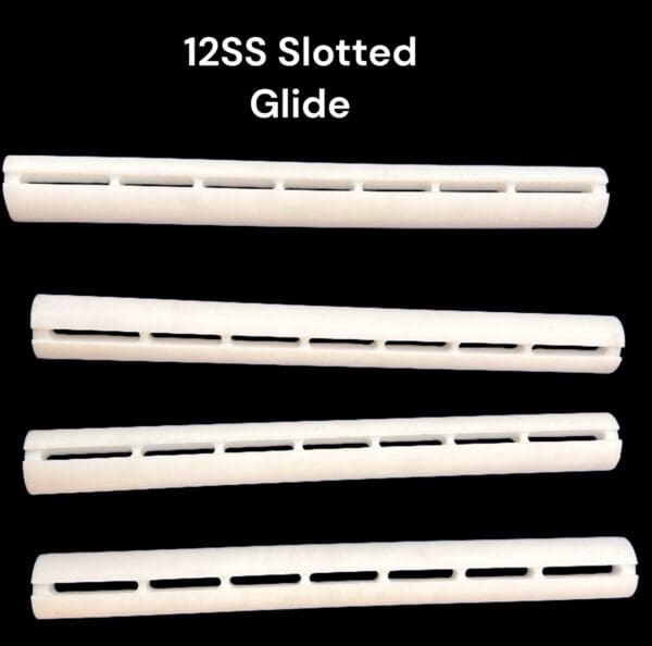 Four white slotted glide tubes.