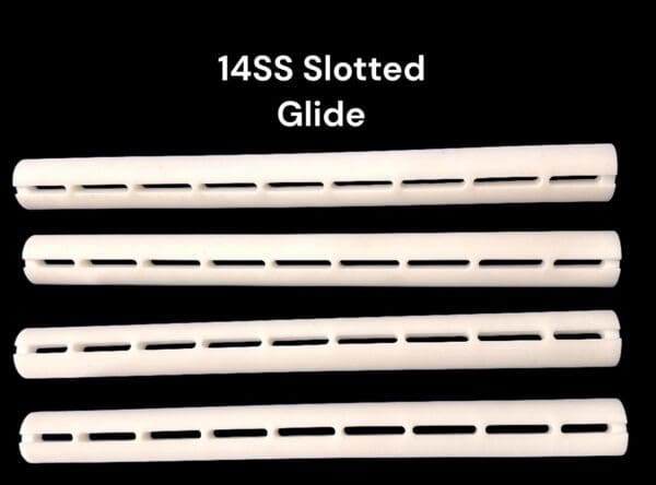 Four white slotted glide rods.