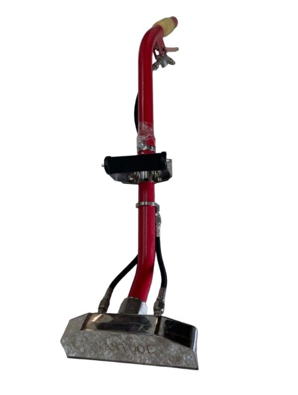 Red and silver carpet cleaning tool.