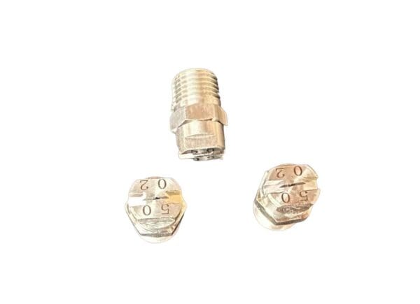 Three silver spray nozzles with markings.