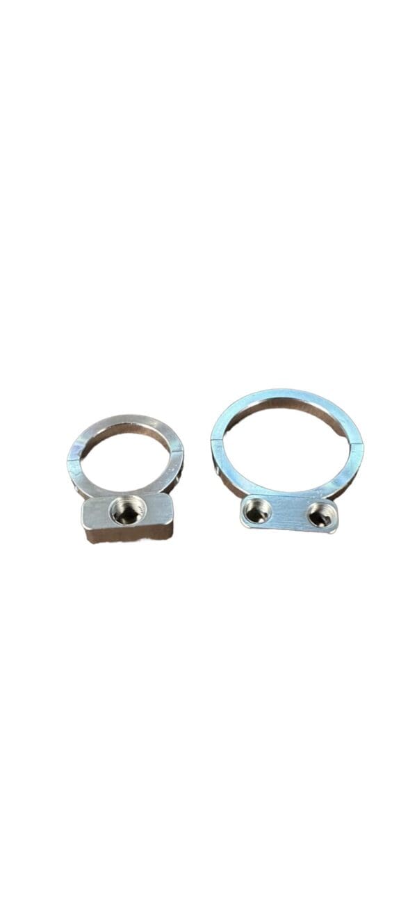 Two metal rings with screw holes.