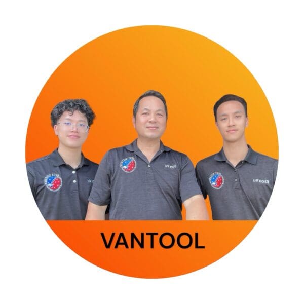 Three men smiling in front of the Vantool logo.