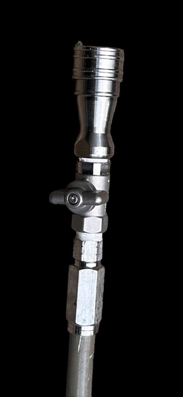 Silver metal valve with handle.