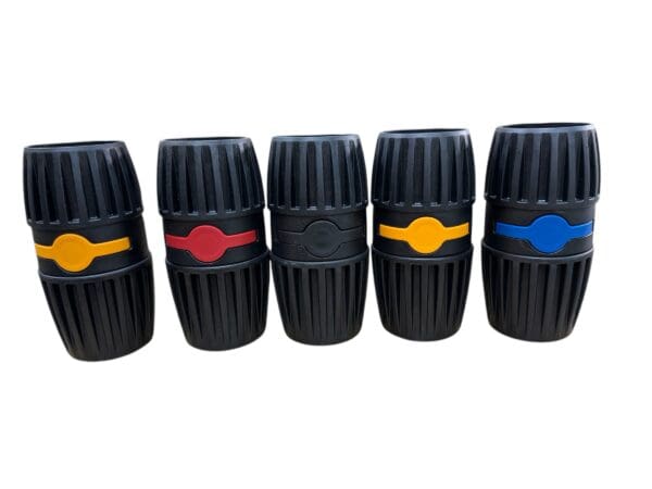 Five black and colored rubber grips.