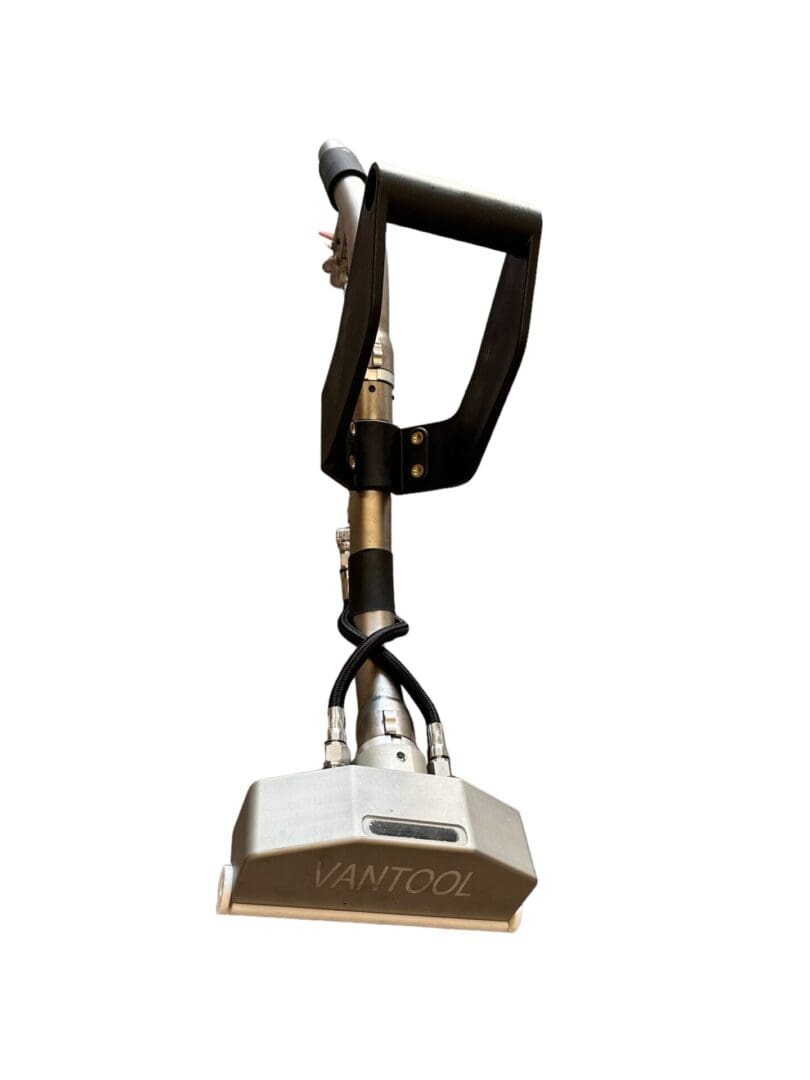 Vantool floor cleaning tool with handle.