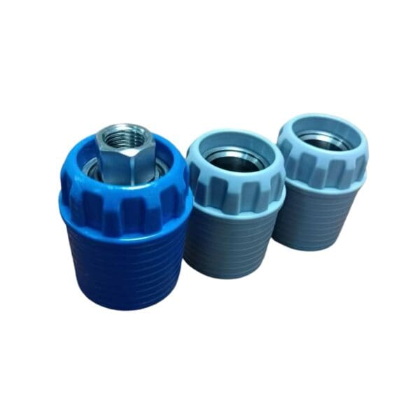 Three blue and gray plastic pipe fittings.